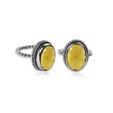 Handcrafted sterling silver Lemon Quartz ring with oval faceted Quartz and rope bezel, artisan jewelry from Indonesia.